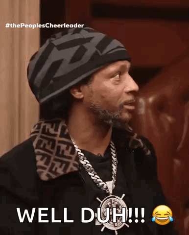 a man wearing a hat and a necklace says well duh !